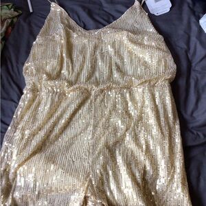 2X Gold Sequin romper fits more like XL